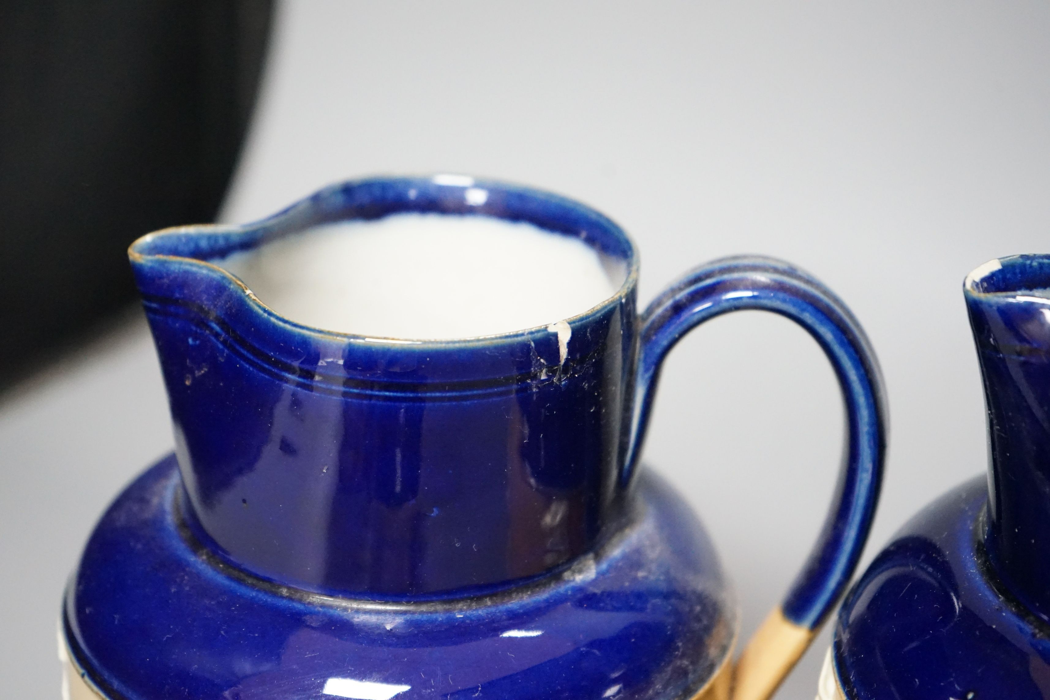 A set of six graduated set of Royal Doulton harvest jugs